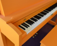 Orange Baldwin Studio Piano
