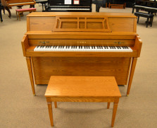 Yamaha console piano in oak